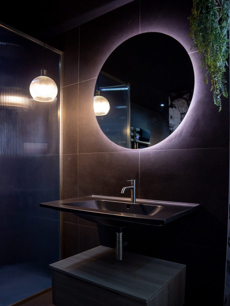 Backlit mirror in bathroom